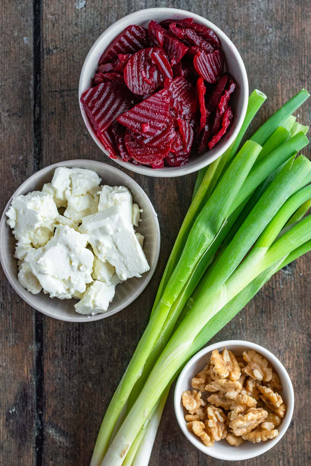 Ingredients for the beet salad: Pickled beet, feta cheese, scallions, and walnuts.