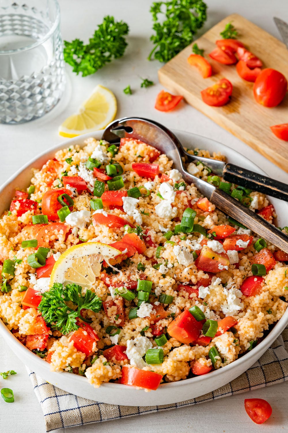 Couscous salad with feta cheese, tomatoes, bell pepper, scallions and fresh parsley.