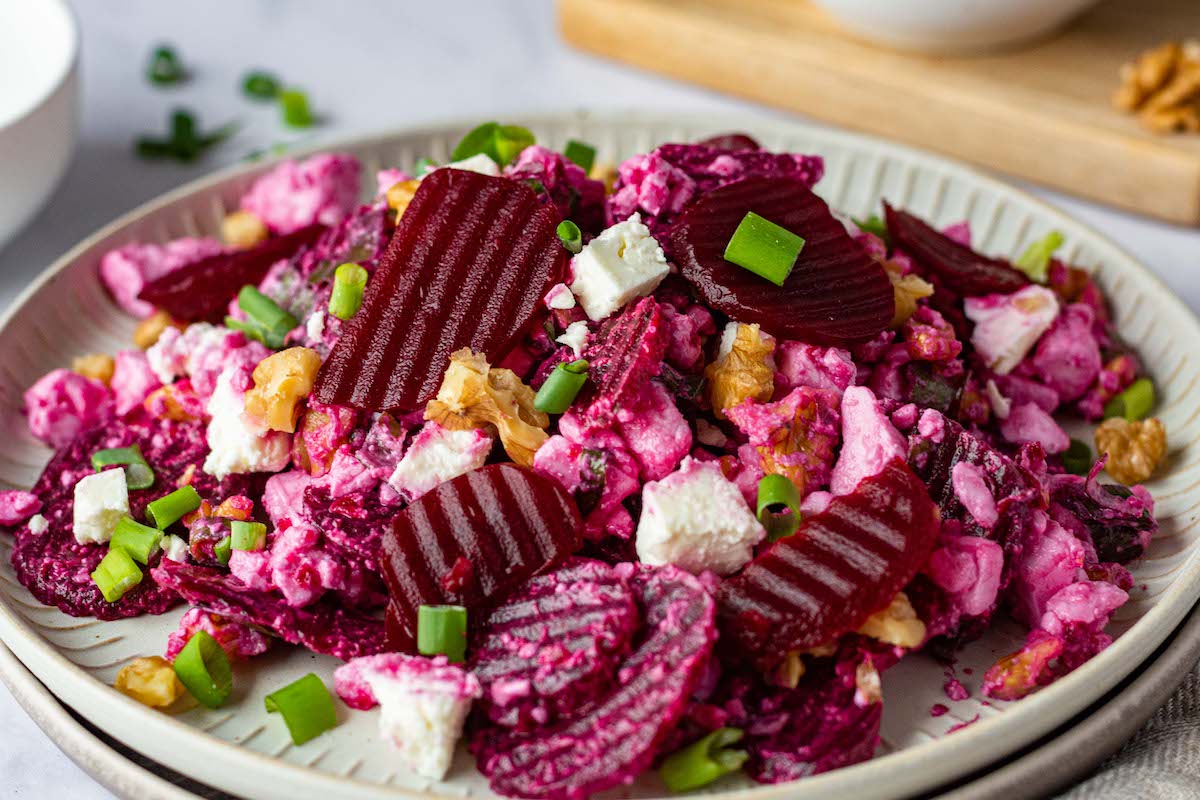 Pickled beet salad with canned beet, feta cheese and walnuts.