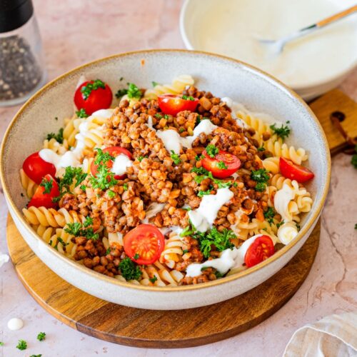 Vegetarian Turkish Pasta with lentils, tomatoes, yogurt and parsley.
