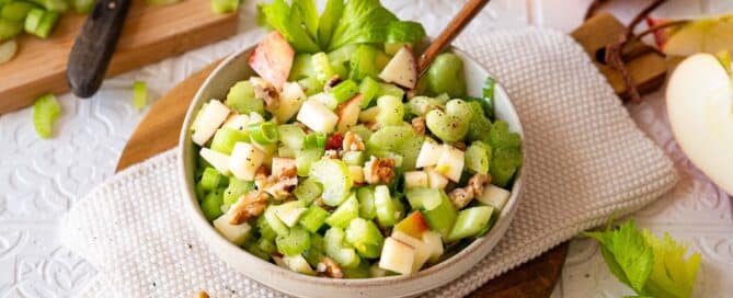 celery apple walnut salad in a bowl.