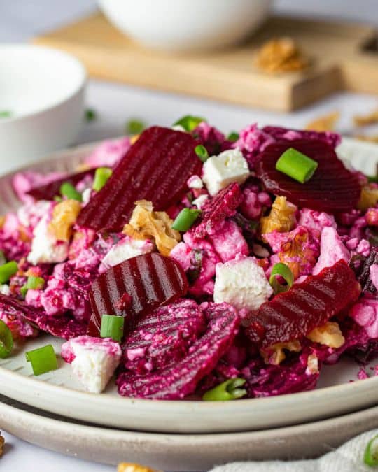 Pickled beet salad with feta cheese, walnuts and scallions.