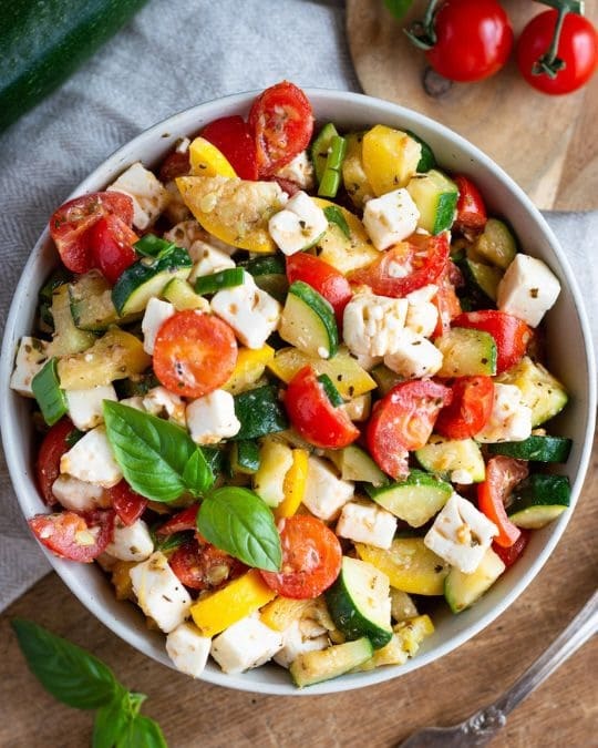 Roasted zucchini salad with tomato and feta.